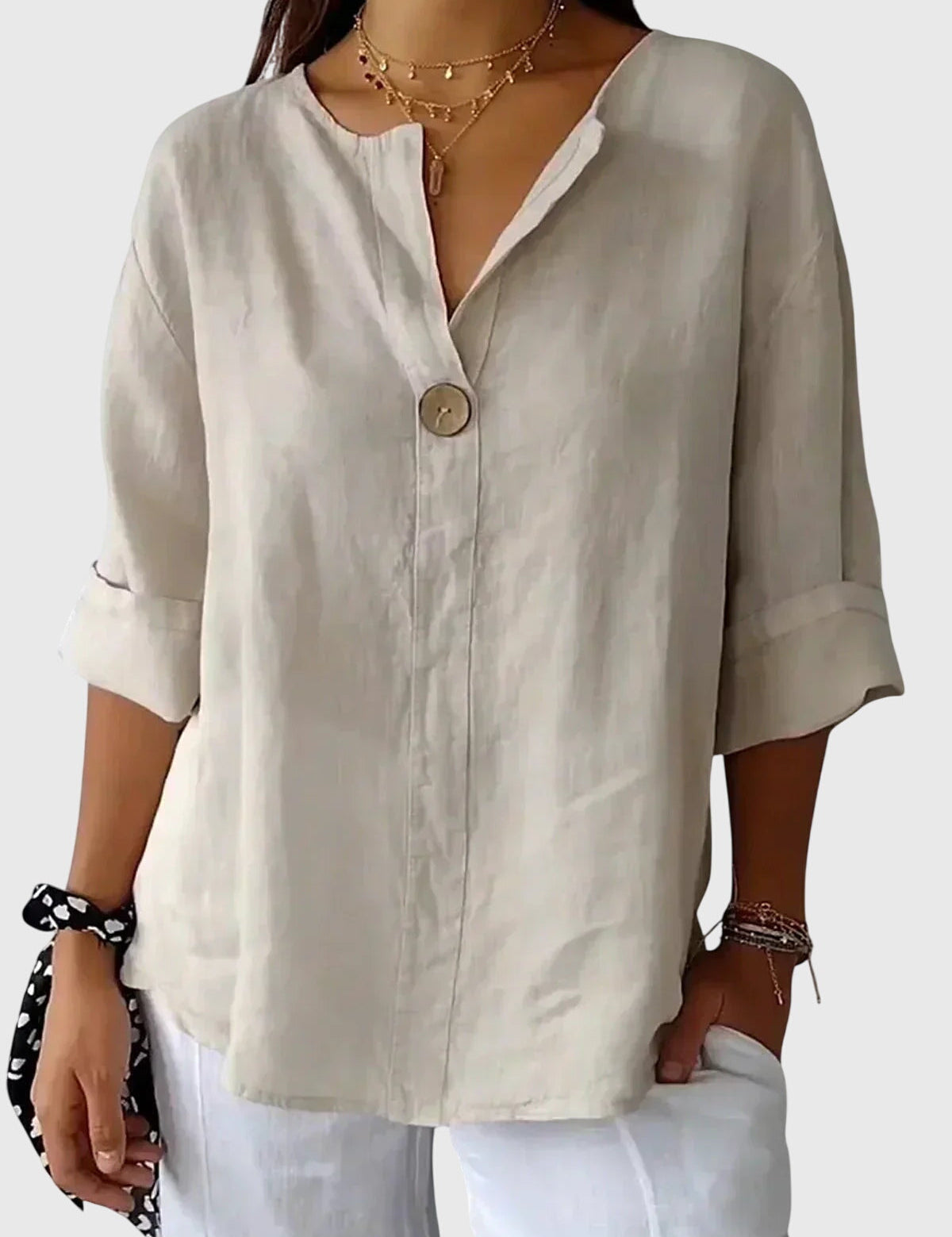 AURORA | BLUSA IN LINO CON BOTTONE DECORATIVO