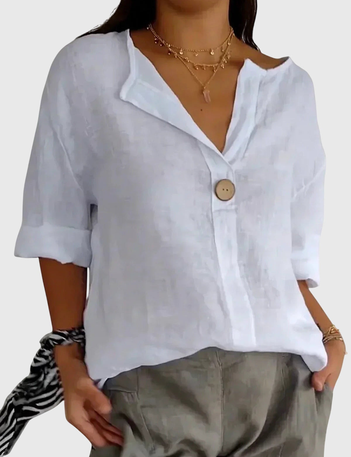 AURORA | BLUSA IN LINO CON BOTTONE DECORATIVO